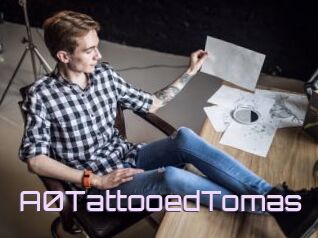 A0TattooedTomas